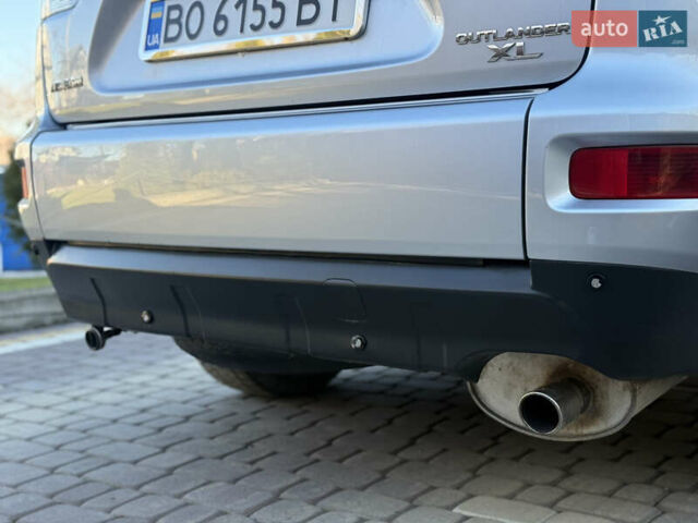 Серый Мицубиси Аутлендер, объемом двигателя 2.4 л и пробегом 218 тыс. км за 9950 $, фото 23 на Automoto.ua