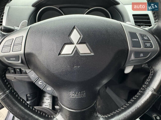 Серый Мицубиси Аутлендер, объемом двигателя 2.2 л и пробегом 230 тыс. км за 11000 $, фото 24 на Automoto.ua