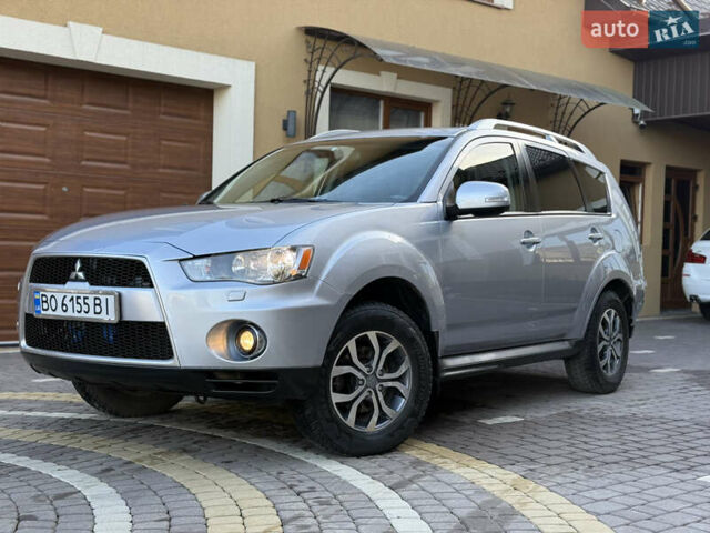 Серый Мицубиси Аутлендер, объемом двигателя 2.4 л и пробегом 218 тыс. км за 9950 $, фото 30 на Automoto.ua