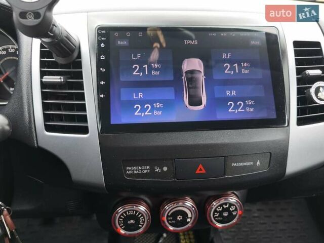 Серый Мицубиси Аутлендер, объемом двигателя 2.3 л и пробегом 263 тыс. км за 11400 $, фото 12 на Automoto.ua