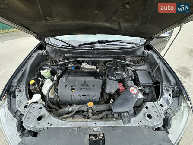 Серый Мицубиси Аутлендер, объемом двигателя 2.4 л и пробегом 270 тыс. км за 8450 $, фото 24 на Automoto.ua