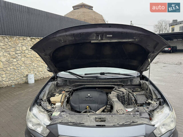 Серый Мицубиси Аутлендер, объемом двигателя 2.2 л и пробегом 230 тыс. км за 11000 $, фото 30 на Automoto.ua