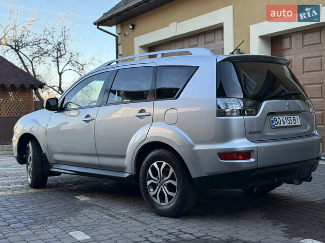 Серый Мицубиси Аутлендер, объемом двигателя 2.4 л и пробегом 218 тыс. км за 9950 $, фото 29 на Automoto.ua