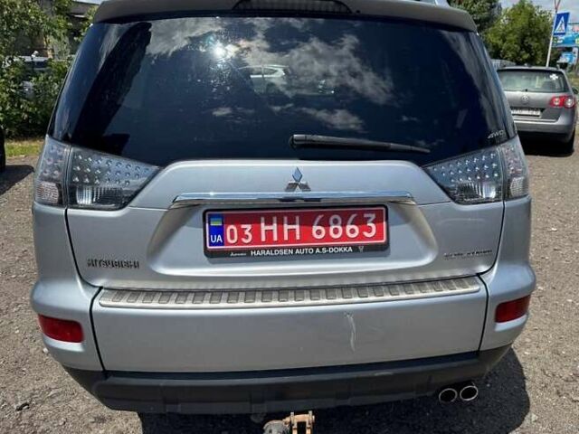Серый Мицубиси Аутлендер, объемом двигателя 2.2 л и пробегом 223 тыс. км за 11500 $, фото 5 на Automoto.ua