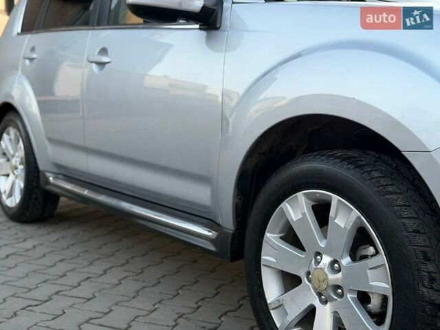 Серый Мицубиси Аутлендер, объемом двигателя 2.18 л и пробегом 294 тыс. км за 10799 $, фото 7 на Automoto.ua