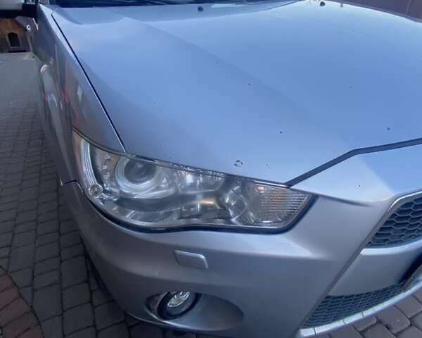 Серый Мицубиси Аутлендер, объемом двигателя 2 л и пробегом 286 тыс. км за 10300 $, фото 7 на Automoto.ua