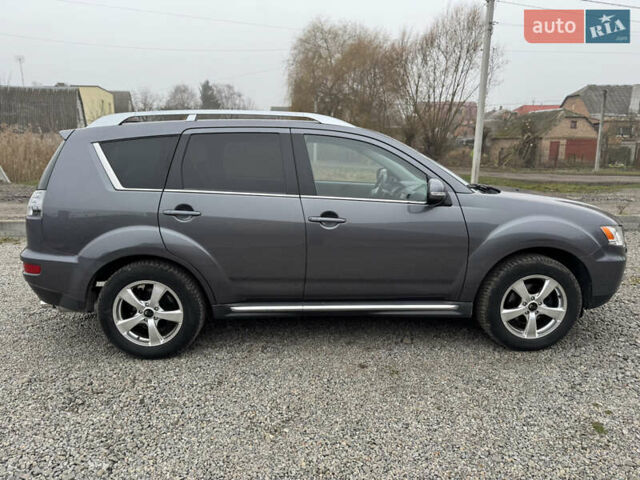 Серый Мицубиси Аутлендер, объемом двигателя 2.2 л и пробегом 289 тыс. км за 11300 $, фото 18 на Automoto.ua
