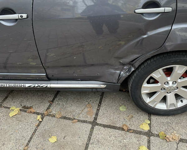 Серый Мицубиси Аутлендер, объемом двигателя 2 л и пробегом 264 тыс. км за 9500 $, фото 9 на Automoto.ua