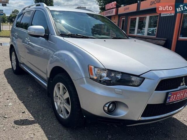 Серый Мицубиси Аутлендер, объемом двигателя 2.2 л и пробегом 223 тыс. км за 11500 $, фото 2 на Automoto.ua