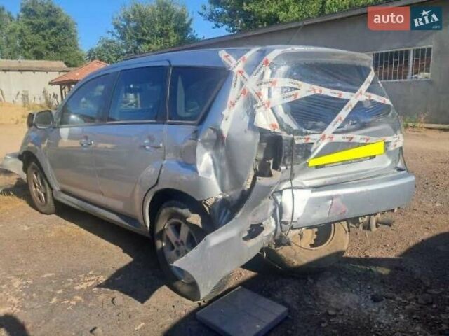 Серый Мицубиси Аутлендер, объемом двигателя 2 л и пробегом 150 тыс. км за 3800 $, фото 5 на Automoto.ua