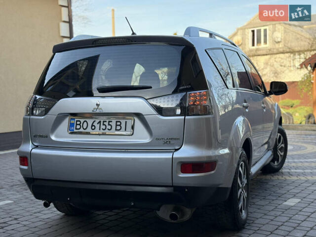 Серый Мицубиси Аутлендер, объемом двигателя 2.4 л и пробегом 218 тыс. км за 9950 $, фото 26 на Automoto.ua