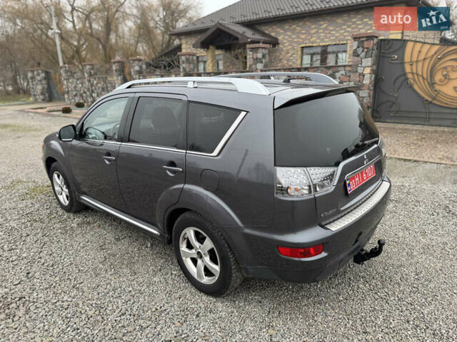 Серый Мицубиси Аутлендер, объемом двигателя 2.2 л и пробегом 289 тыс. км за 11300 $, фото 31 на Automoto.ua