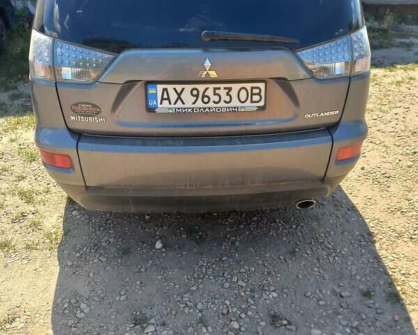 Сірий Міцубісі Аутлендер, об'ємом двигуна 2.36 л та пробігом 145 тис. км за 10500 $, фото 1 на Automoto.ua
