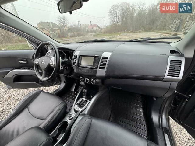 Серый Мицубиси Аутлендер, объемом двигателя 2.2 л и пробегом 289 тыс. км за 11300 $, фото 66 на Automoto.ua