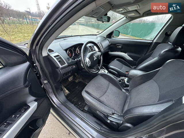 Серый Мицубиси Аутлендер, объемом двигателя 2.4 л и пробегом 270 тыс. км за 8450 $, фото 7 на Automoto.ua