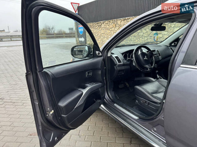 Серый Мицубиси Аутлендер, объемом двигателя 2.2 л и пробегом 230 тыс. км за 11000 $, фото 11 на Automoto.ua