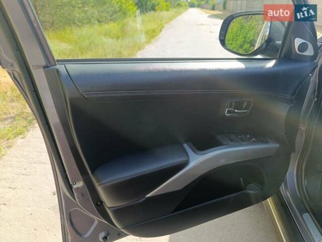 Серый Мицубиси Аутлендер, объемом двигателя 2.4 л и пробегом 220 тыс. км за 11800 $, фото 21 на Automoto.ua