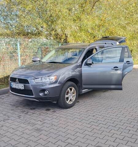Серый Мицубиси Аутлендер, объемом двигателя 2.3 л и пробегом 294 тыс. км за 9600 $, фото 12 на Automoto.ua