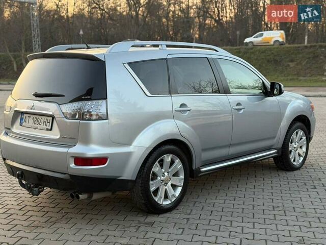 Серый Мицубиси Аутлендер, объемом двигателя 2.18 л и пробегом 294 тыс. км за 10799 $, фото 3 на Automoto.ua