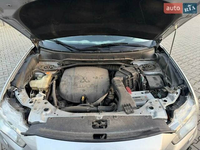 Серый Мицубиси Аутлендер, объемом двигателя 2.18 л и пробегом 294 тыс. км за 10799 $, фото 21 на Automoto.ua