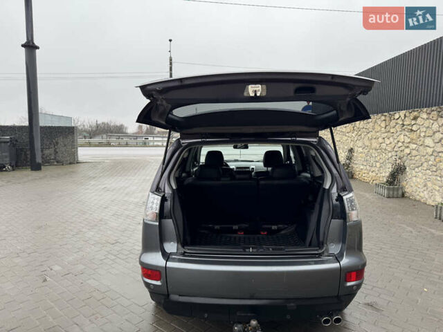 Серый Мицубиси Аутлендер, объемом двигателя 2.2 л и пробегом 230 тыс. км за 11000 $, фото 15 на Automoto.ua