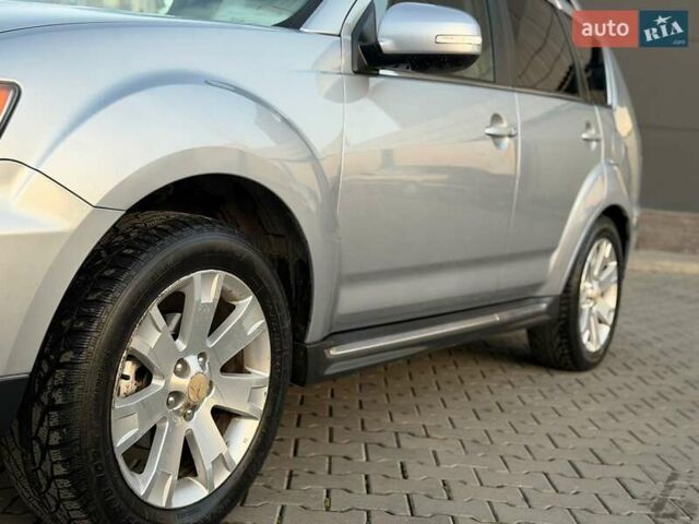 Серый Мицубиси Аутлендер, объемом двигателя 2.18 л и пробегом 294 тыс. км за 10799 $, фото 9 на Automoto.ua