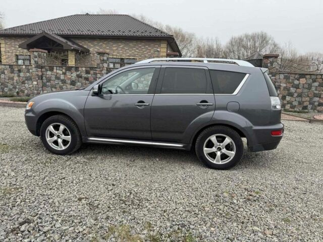 Серый Мицубиси Аутлендер, объемом двигателя 2.2 л и пробегом 289 тыс. км за 11300 $, фото 9 на Automoto.ua