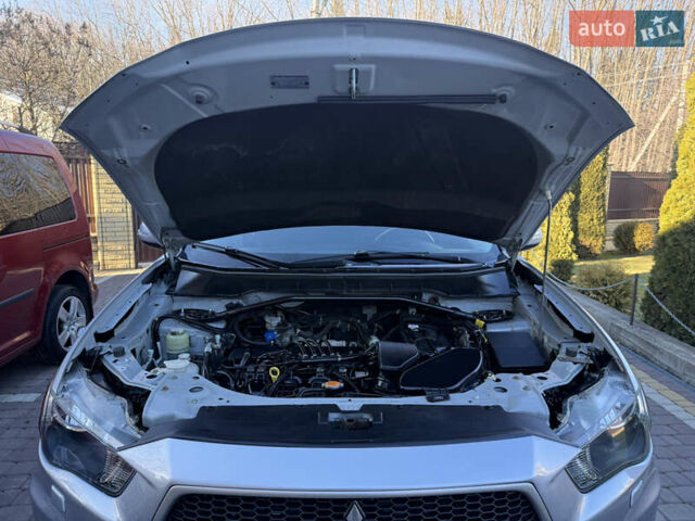 Серый Мицубиси Аутлендер, объемом двигателя 2.4 л и пробегом 218 тыс. км за 9950 $, фото 33 на Automoto.ua