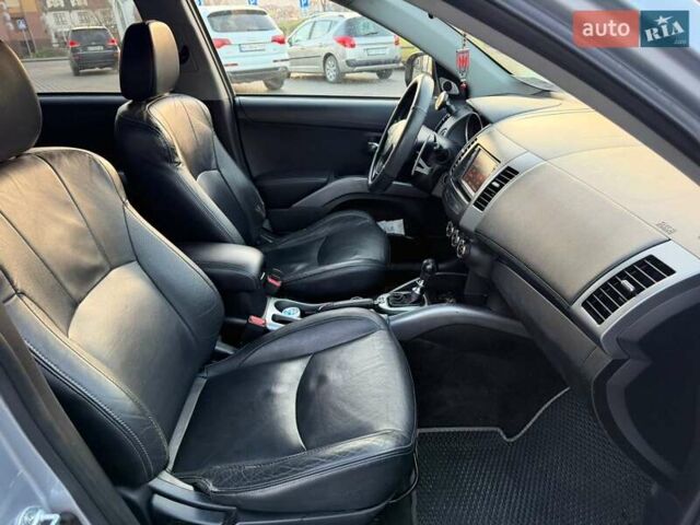 Серый Мицубиси Аутлендер, объемом двигателя 2.18 л и пробегом 294 тыс. км за 10799 $, фото 12 на Automoto.ua