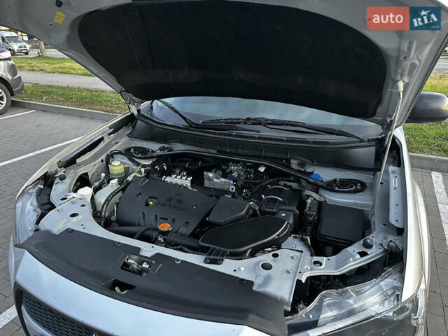 Мицубиси Аутлендер 2010 в Белой Церкве на Automoto.ua Серый Мицубиси Аутлендер, объемом двигателя 2.36 л и пробегом 220 тыс. км за 9000 $, фото 12 на Automoto.ua