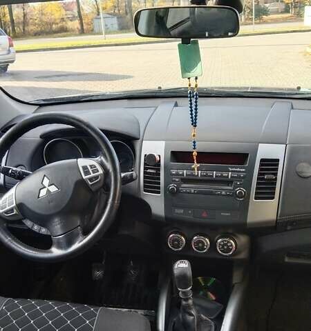 Серый Мицубиси Аутлендер, объемом двигателя 2.3 л и пробегом 294 тыс. км за 9600 $, фото 9 на Automoto.ua