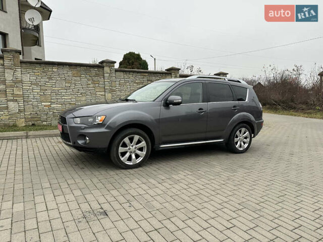 Серый Мицубиси Аутлендер, объемом двигателя 2.2 л и пробегом 217 тыс. км за 10900 $, фото 3 на Automoto.ua