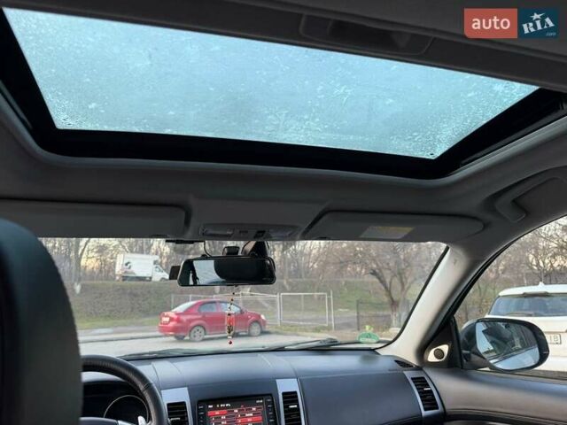 Серый Мицубиси Аутлендер, объемом двигателя 2.18 л и пробегом 294 тыс. км за 10799 $, фото 23 на Automoto.ua