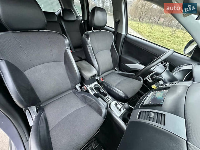 Серый Мицубиси Аутлендер, объемом двигателя 2.4 л и пробегом 270 тыс. км за 8450 $, фото 9 на Automoto.ua