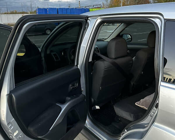 Мицубиси Аутлендер 2010 в Белой Церкве на Automoto.ua Серый Мицубиси Аутлендер, объемом двигателя 2.36 л и пробегом 220 тыс. км за 9000 $, фото 16 на Automoto.ua