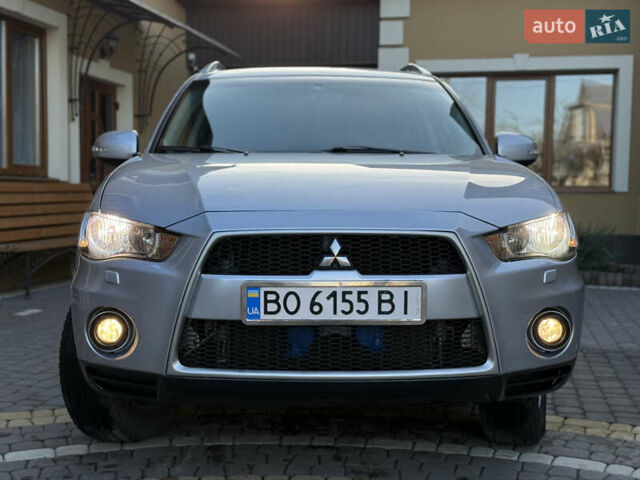 Серый Мицубиси Аутлендер, объемом двигателя 2.4 л и пробегом 218 тыс. км за 9950 $, фото 24 на Automoto.ua