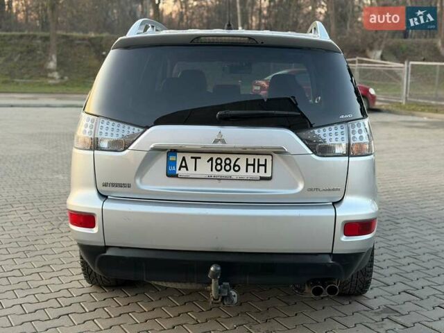 Серый Мицубиси Аутлендер, объемом двигателя 2.18 л и пробегом 294 тыс. км за 10799 $, фото 4 на Automoto.ua