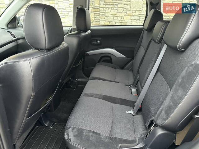 Серый Мицубиси Аутлендер, объемом двигателя 2.2 л и пробегом 217 тыс. км за 10900 $, фото 12 на Automoto.ua