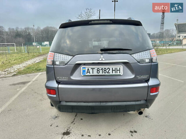 Серый Мицубиси Аутлендер, объемом двигателя 2.4 л и пробегом 270 тыс. км за 8450 $, фото 3 на Automoto.ua