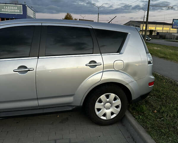 Мицубиси Аутлендер 2010 в Белой Церкве на Automoto.ua Серый Мицубиси Аутлендер, объемом двигателя 2.36 л и пробегом 220 тыс. км за 9000 $, фото 3 на Automoto.ua