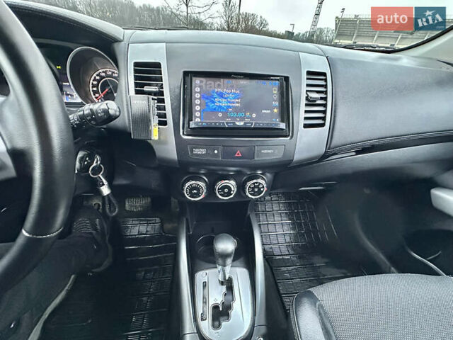 Серый Мицубиси Аутлендер, объемом двигателя 2.4 л и пробегом 270 тыс. км за 8450 $, фото 14 на Automoto.ua