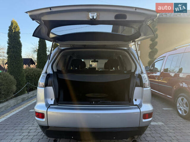 Серый Мицубиси Аутлендер, объемом двигателя 2.4 л и пробегом 218 тыс. км за 9950 $, фото 14 на Automoto.ua