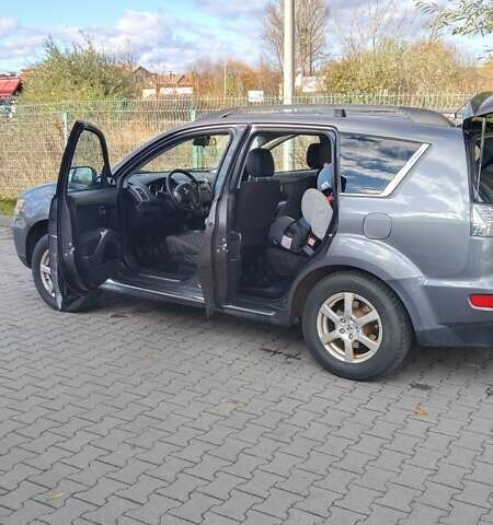 Серый Мицубиси Аутлендер, объемом двигателя 2.3 л и пробегом 294 тыс. км за 9600 $, фото 13 на Automoto.ua