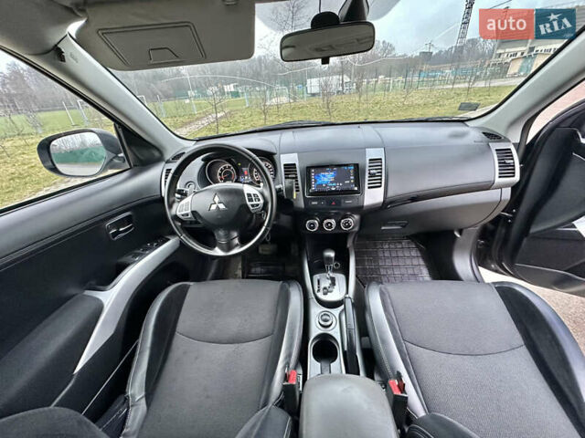Серый Мицубиси Аутлендер, объемом двигателя 2.4 л и пробегом 270 тыс. км за 8450 $, фото 12 на Automoto.ua