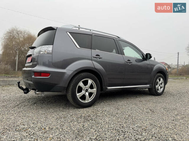 Серый Мицубиси Аутлендер, объемом двигателя 2.2 л и пробегом 289 тыс. км за 11300 $, фото 20 на Automoto.ua