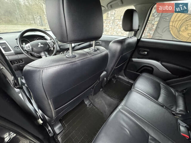 Серый Мицубиси Аутлендер, объемом двигателя 2.2 л и пробегом 289 тыс. км за 11300 $, фото 51 на Automoto.ua