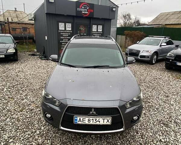 Серый Мицубиси Аутлендер, объемом двигателя 2.36 л и пробегом 143 тыс. км за 11500 $, фото 7 на Automoto.ua