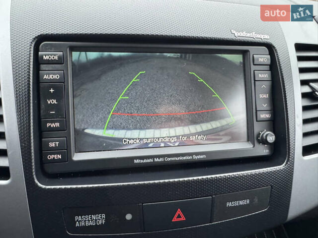 Серый Мицубиси Аутлендер, объемом двигателя 2.2 л и пробегом 289 тыс. км за 11300 $, фото 76 на Automoto.ua