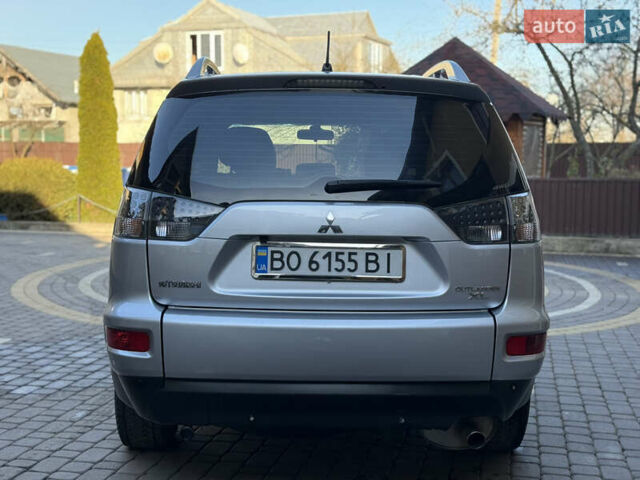 Серый Мицубиси Аутлендер, объемом двигателя 2.4 л и пробегом 218 тыс. км за 9950 $, фото 27 на Automoto.ua