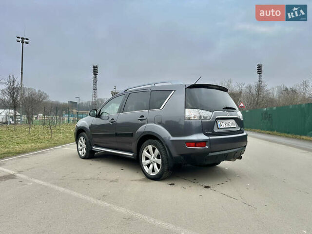 Серый Мицубиси Аутлендер, объемом двигателя 2.4 л и пробегом 270 тыс. км за 8450 $, фото 2 на Automoto.ua